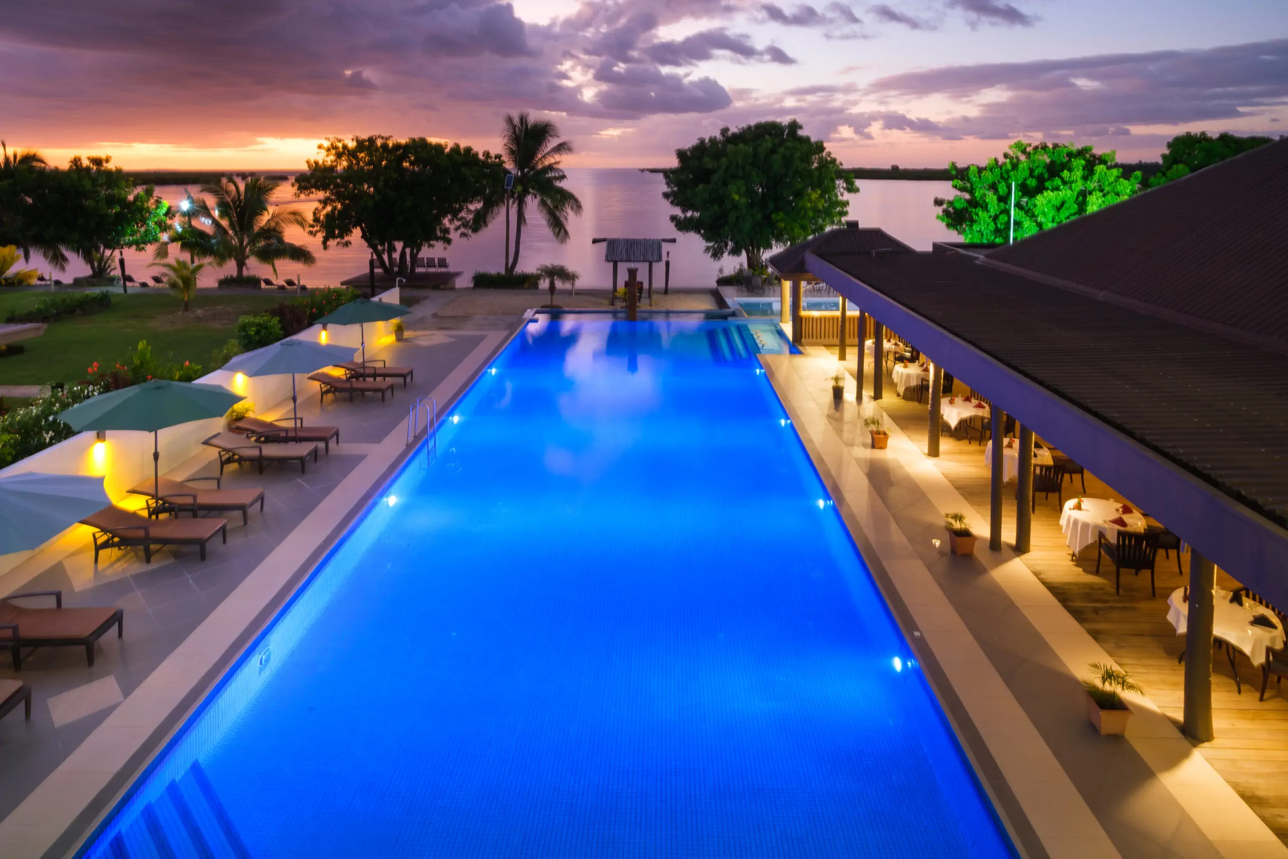 Landers Bay Resort pool at sunset during a Fiji stopover near Nadi Airport